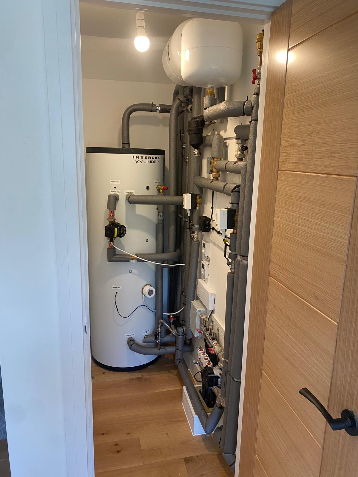 Air source heat pump installed outside a home